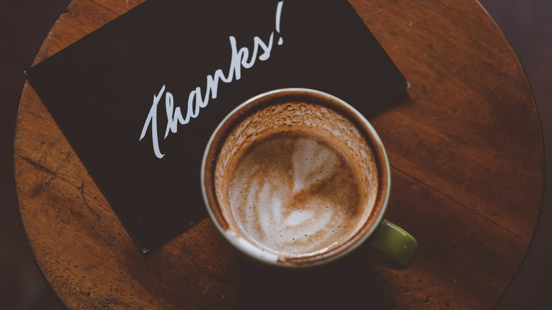 thank-you-card-on-table-with-latte