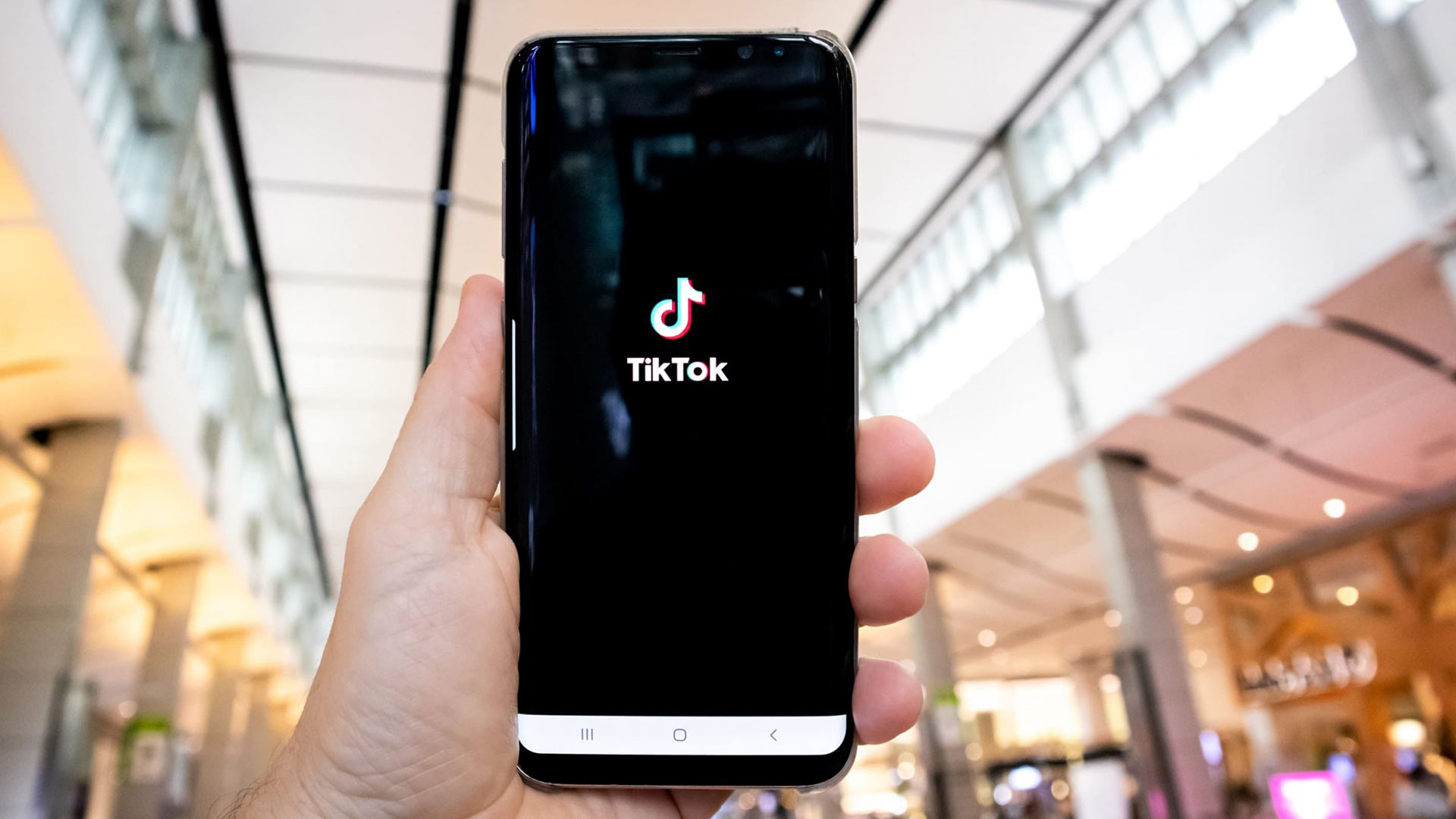 Phone with tiktok opening screen