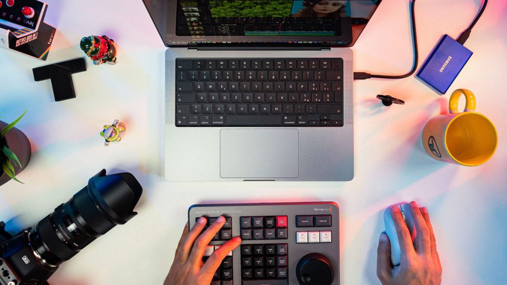 video editor working on a laptop