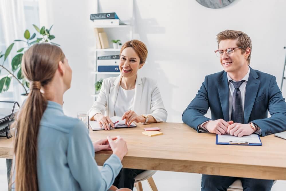 hiring team conducting an interview with potential employee